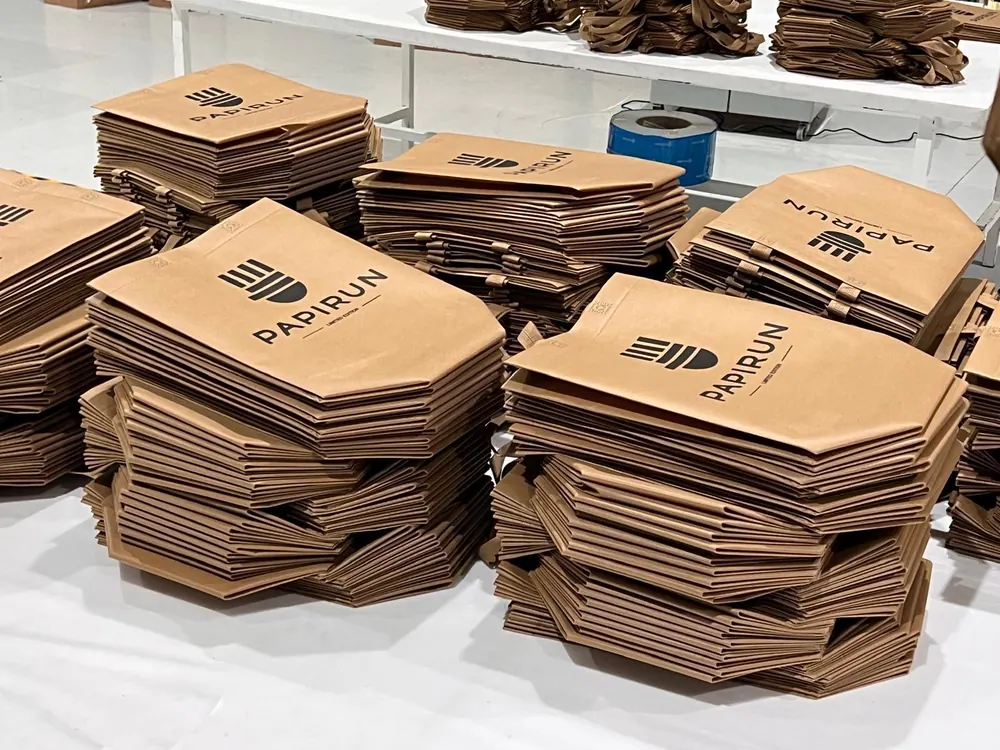 Stacks of printed bag panels prepared for assembly
